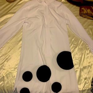 White dress with black polkas at the bottom. Never worn- mid-sleeve